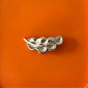vintage metallic silver toned leaf sculpture metal brooch pin signed Gerry's